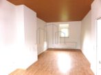 Platz für Ideen, Ruhe mitten im Leben – 3 Zimmer im Denkmalhaus - Wohnzimmer
