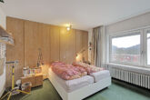 ARCHITEKTENHAUS MIT BESONDERER RAUMSTRUKTUR, PRIVATEM INNENHOF & VIEL PLATZ FÜR DIE FAMILIE! - Schlafzimmer