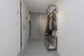 Moderne 2-Zimmer-Wohnung mit Terrasse & Stellplatz in ruhiger Lage - Garderobe