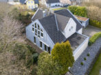 Luxuriöses Wohnen in architektonischem Unikat – Koiteich, Sauna, Solaranlage & mehr - Hausansicht