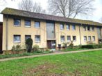 Charmante 3-Zimmer-Erdgeschosswohnung mit Balkon und Einbauküche - Hausansicht