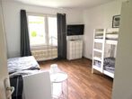 Charmante 3-Zimmer-Erdgeschosswohnung mit Balkon und Einbauküche - Schlafzimmer