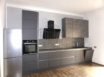 Stilvoll sanierte 2-Zimmer-Wohnung mit Garten in ruhiger Lage - Küche